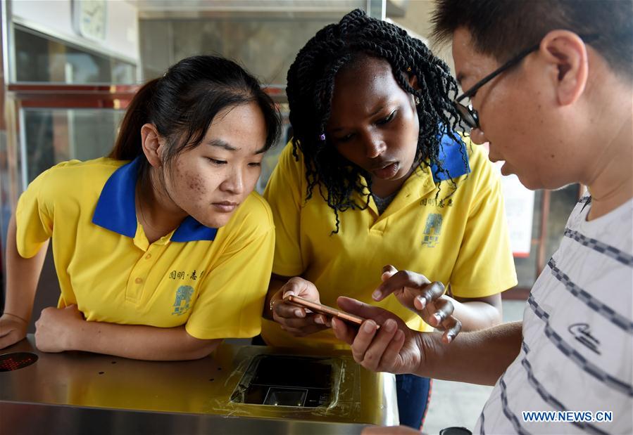 CHINA-BEIJING-YUANMINGYUAN PARK-AFRICAN VOLUNTEERS (CN)