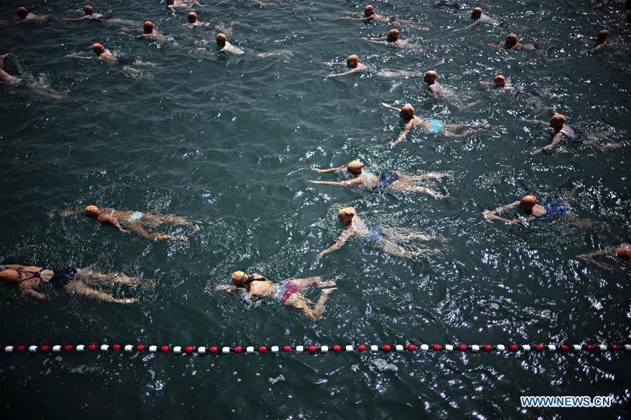 SWITZERLAND-ZURICH-LAKE CROSSING-SWIMMING