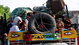 Afghan refugees depart for home under UNHCR return program