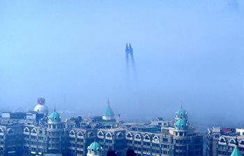 In pics: fog-covered cityscape of Dalian, N China's Liaoning